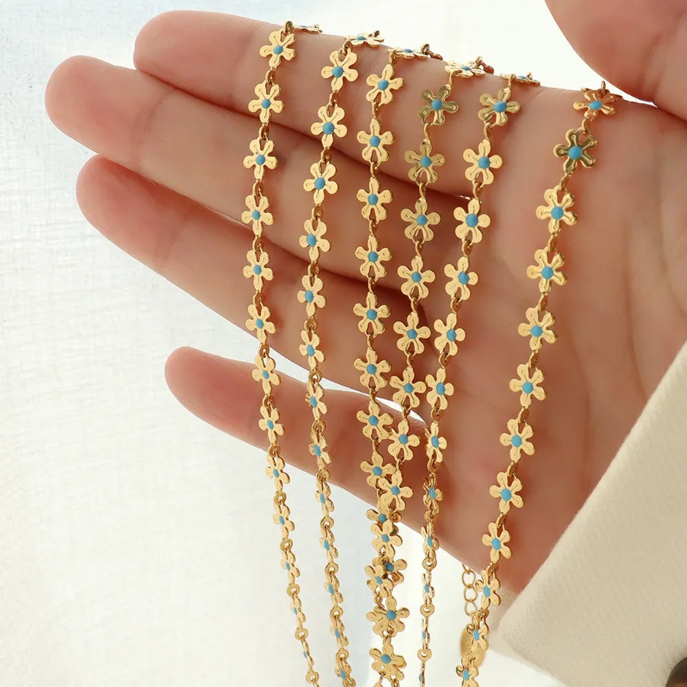 Collier Fleur Émaillée Bleue Acier Titane Doré | Boutique84
