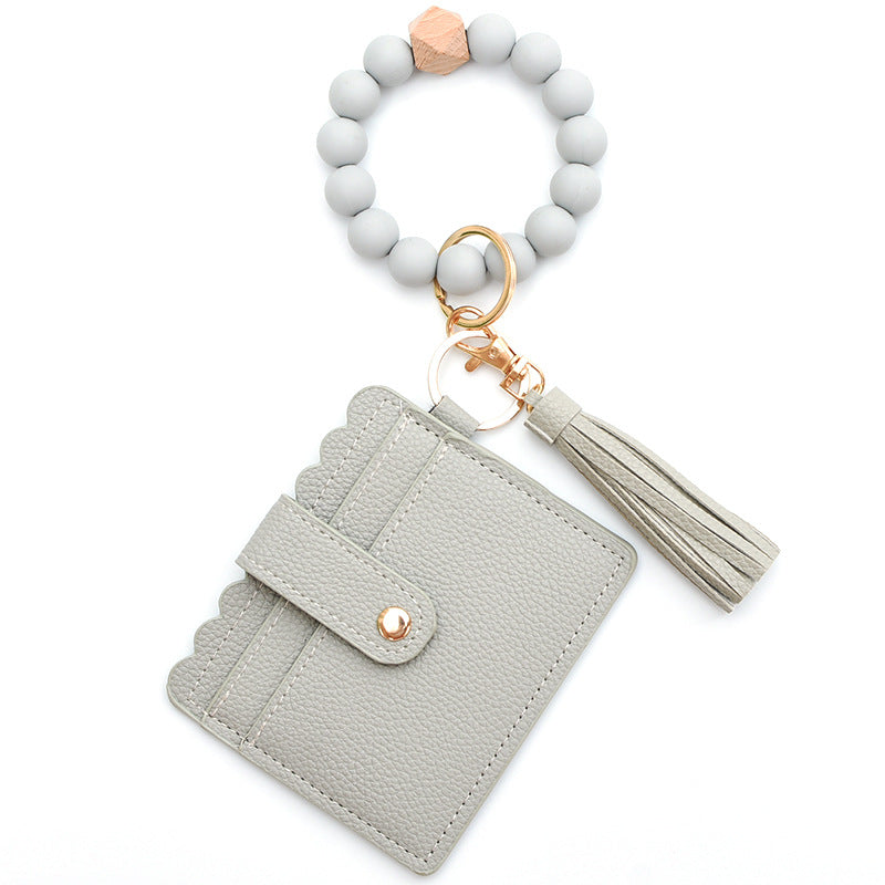 Bracelet Porte-Cartes Perles Silicone Pompon | Boutique84