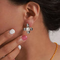 Boucles d'Oreilles Fleur Perle Acier Titane | Boutique84