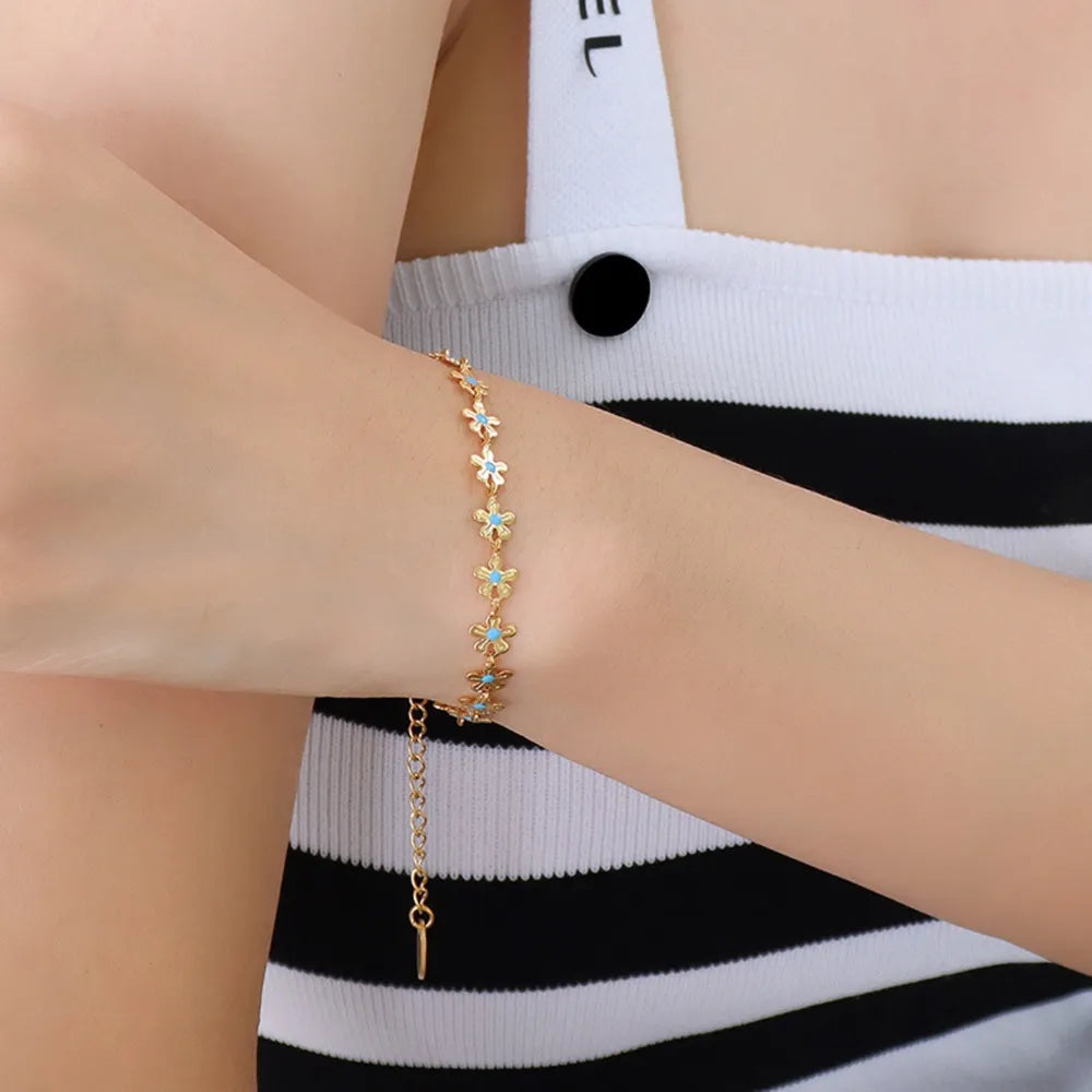 Bracelet Fleur Émaillée Bleue Acier Titane Doré | Boutique84