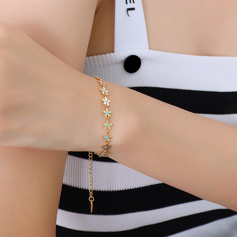 Bracelet Fleur Émaillée Bleue Acier Titane Doré | Boutique84