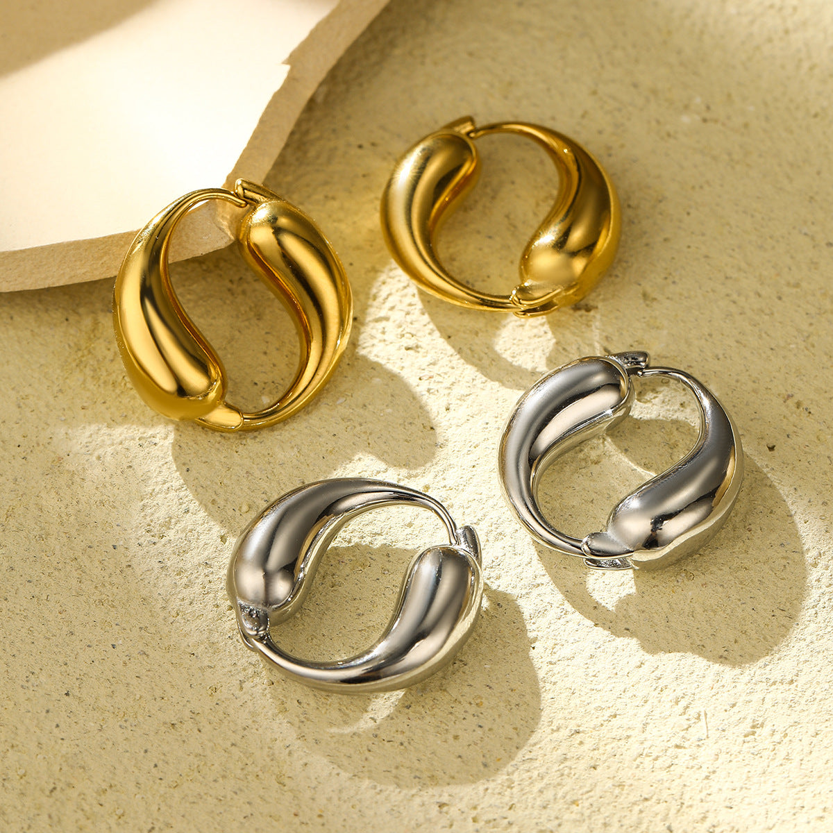 Boucles d'Oreilles Créoles Goutte Acier Doré 18K | Boutique84