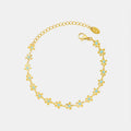 Bracelet Fleur Émaillée Bleue Acier Titane Doré | Boutique84