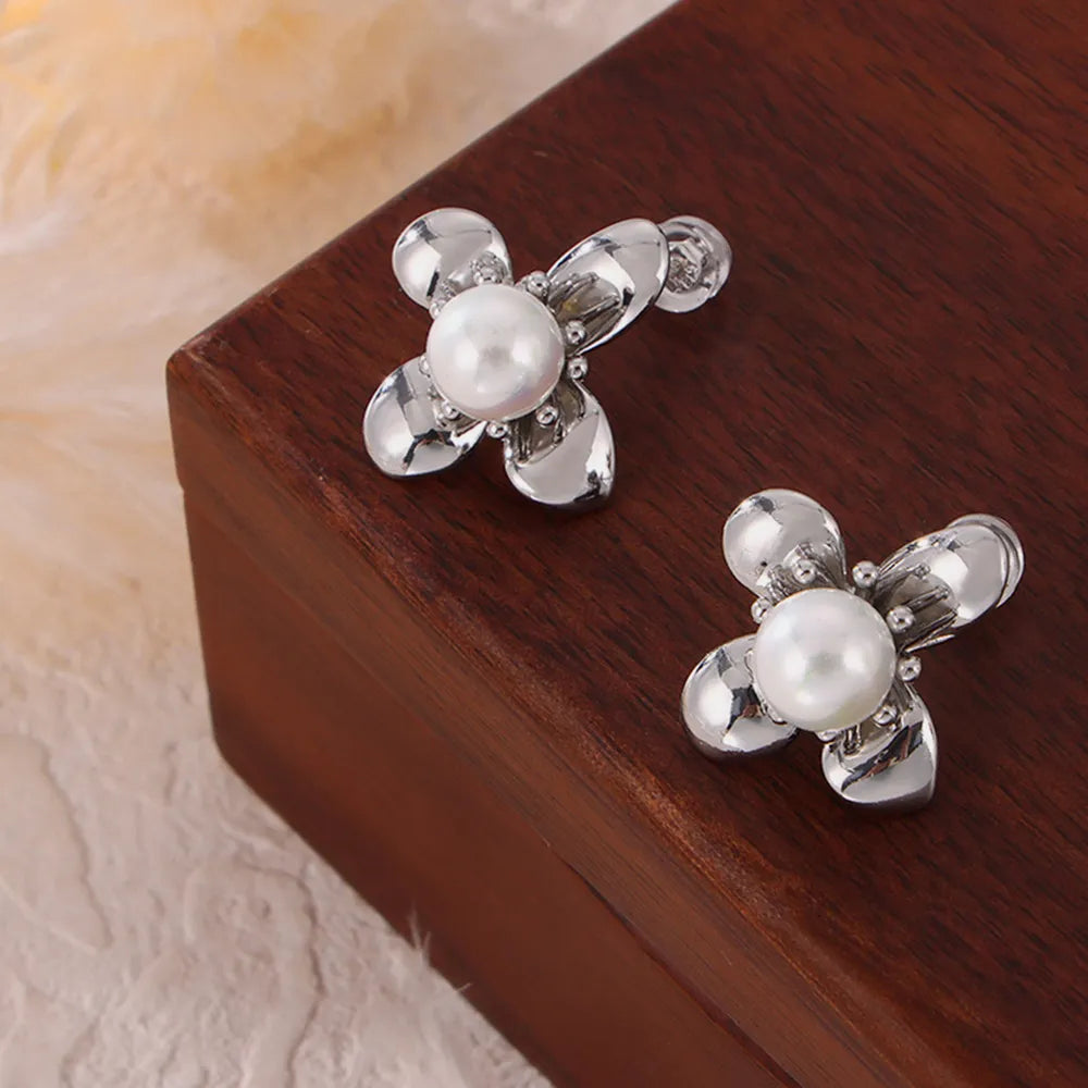 Boucles d'Oreilles Fleur Perle Acier Titane | Boutique84