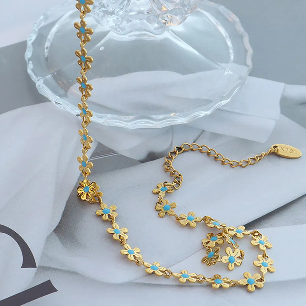 Collier Fleur Émaillée Bleue Acier Titane Doré | Boutique84