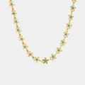 Collier Fleur Émaillée Bleue Acier Titane Doré | Boutique84