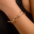 Double layered hollow knot opening bracelet for women's fashionable commuting style and flat line handmade accessories
